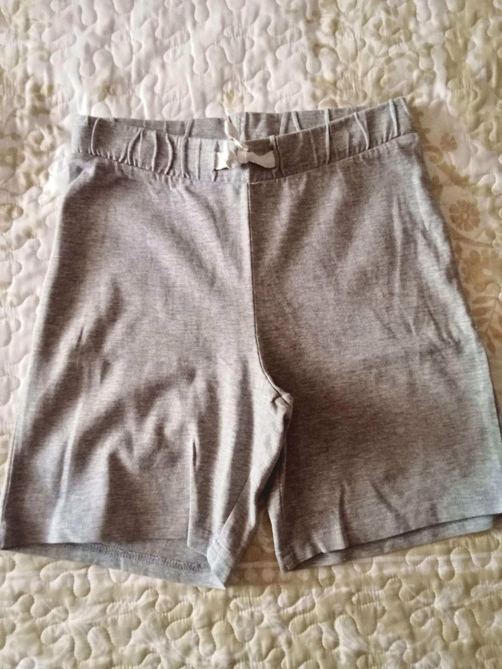 Pantalón niño 7-8 años gris con bolsillo trasero y cordón ajustable